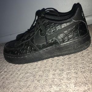 Black textured Nike Air Force ones